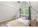 Bright bedroom featuring vaulted ceilings, exposed beams, and natural light at 809 Iron Bridge Rd, Cicero, IN 46034
