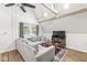 Bright living room features vaulted ceilings, natural light, and a comfortable sectional sofa at 809 Iron Bridge Rd, Cicero, IN 46034