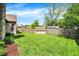 Spacious backyard with lush green lawn and storage shed at 9255 Fireside Dr, Indianapolis, IN 46250