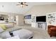 Open concept living room featuring a entertainment center and vaulted ceilings at 9255 Fireside Dr, Indianapolis, IN 46250