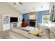 Inviting living room with stone fireplace, built-in shelves, and comfortable seating at 9255 Fireside Dr, Indianapolis, IN 46250