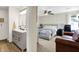 Main bedroom features an ensuite bathroom, comfy leather sofa and plenty of natural light at 9255 Fireside Dr, Indianapolis, IN 46250