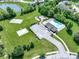 A beautiful aerial view of a community pool, playground, volleyball court, and basketball court at 10155 Landis Blvd, Fortville, IN 46040