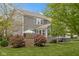 Serene backyard with a relaxing hot tub and well-maintained lawn at 10155 Landis Blvd, Fortville, IN 46040