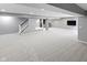 Basement featuring a spacious layout with modern recessed lighting, light gray walls, and neutral carpet at 10155 Landis Blvd, Fortville, IN 46040