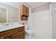 Cozy bathroom featuring a tub-shower, vanity, and toilet at 10833 Tournament Ln, Indianapolis, IN 46229