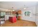 Spacious kitchen with an island and a view of the dining room at 10833 Tournament Ln, Indianapolis, IN 46229