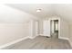 Bedroom with neutral paint, gray carpet, and white doors at 1115 N Keystone Ave, Indianapolis, IN 46201