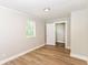 Standard bedroom with closet, natural light and hardwood floors at 1115 N Keystone Ave, Indianapolis, IN 46201