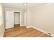 Standard bedroom with natural light, closet and hardwood floors at 1115 N Keystone Ave, Indianapolis, IN 46201