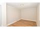Standard bedroom with natural light, hardwood floors and neutral paint at 1115 N Keystone Ave, Indianapolis, IN 46201