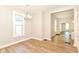 Cozy living room with hardwood floors and neutral paint, and decorative lighting at 1115 N Keystone Ave, Indianapolis, IN 46201