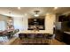 Modern kitchen featuring stainless steel appliances, a large island, and bar stool seating at 11204 Sashing Way, Monrovia, IN 46157