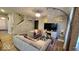 Inviting living room featuring modern sofas, a large television, and stylish decor at 11204 Sashing Way, Monrovia, IN 46157
