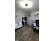 Bright home office featuring a desk, workstation, comfortable futon, and modern decor at 11204 Sashing Way, Monrovia, IN 46157