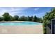 Large outdoor pool area with lounge chairs and a water tower in the background at 11204 Sashing Way, Monrovia, IN 46157