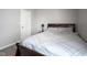 Comfortable bedroom showcases a neutral color scheme and a full-sized bed at 1181 Galaxy Ln, Danville, IN 46122