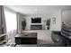 Cozy living room featuring a fireplace, comfortable seating, and stylish decor at 1181 Galaxy Ln, Danville, IN 46122