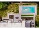 A high-angle showcases the backyard pool, landscaped yard, and modern home at 11911 Eden Glen Dr, Carmel, IN 46033
