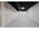Unfinished basement with painted walls and ceiling, ready for customization at 11911 Eden Glen Dr, Carmel, IN 46033