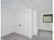 Neutral bedroom featuring carpet, minimalist design and a black framed window at 11911 Eden Glen Dr, Carmel, IN 46033