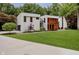 Modern two-story home featuring a beautifully landscaped lawn and mixed material exterior at 11911 Eden Glen Dr, Carmel, IN 46033