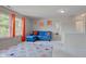 Spacious second floor living area with abundant natural light and stylish decor with bedroom access at 1238 Aggie Ln, Indianapolis, IN 46260