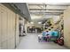 Unfinished basement with laundry machines, storage, and exposed ductwork, providing ample space at 1245 Kessler Blvd E Dr, Indianapolis, IN 46220