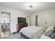 Bright bedroom leads to a dining room, en-suite bathroom and closet at 1245 Kessler Blvd E Dr, Indianapolis, IN 46220
