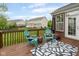 Cozy back deck offering a relaxing outdoor space with comfortable seating and view of the backyard at 13234 Amundson Dr, Carmel, IN 46074