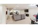 Finished basement with exercise equipment, lounge area, and neutral carpeting providing a functional and versatile space at 13234 Amundson Dr, Carmel, IN 46074
