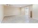 Unfurnished basement with tile flooring leading to a bathroom offering potential for customization and various uses at 13234 Amundson Dr, Carmel, IN 46074