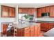 Bright kitchen featuring stainless steel appliances, an island, and a cozy breakfast nook at 13234 Amundson Dr, Carmel, IN 46074