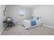 Bright bedroom featuring a neutral color scheme, plush carpeting, and comfortable furnishings at 1328 Toner Dr, Anderson, IN 46012