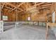 Interior view of the detached two car garage with cement foundation at 1328 Toner Dr, Anderson, IN 46012