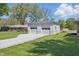 Detached two-car garage featuring two garage doors and gravel driveway at 1328 Toner Dr, Anderson, IN 46012