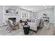 Stylish living room featuring a fireplace, wood floors, and an open, airy layout at 1328 Toner Dr, Anderson, IN 46012