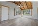 Charming sunroom filled with natural light and a wood-paneled ceiling at 1328 Toner Dr, Anderson, IN 46012
