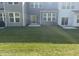 Well-maintained backyard with green lawn and patio area at 13460 Dewpoint Ln, Fishers, IN 46037
