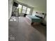 Spacious bedroom with natural light, modern headboard and carpeted floor at 13460 Dewpoint Ln, Fishers, IN 46037