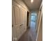 Hallway featuring closet and view into bedroom at 13460 Dewpoint Ln, Fishers, IN 46037