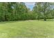 This large backyard features a fire pit and seating area, perfect for outdoor gatherings at 1409 S Northview Dr, Martinsville, IN 46151