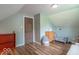 Comfortable bedroom with sloped ceiling at 1409 S Northview Dr, Martinsville, IN 46151