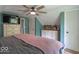 Bedroom featuring a ceiling fan and lots of storage at 1409 S Northview Dr, Martinsville, IN 46151