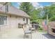 This spacious deck includes a grill, a stone fire pit, and outdoor seating at 1409 S Northview Dr, Martinsville, IN 46151