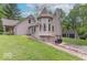 Charming home featuring a turret, well-maintained lawn, and a garage at 1409 S Northview Dr, Martinsville, IN 46151