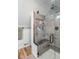 Modern shower with built-in seat and shelving at 1409 S Northview Dr, Martinsville, IN 46151