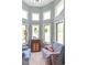 Bright sitting area filled with many windows to enjoy natural light at 1409 S Northview Dr, Martinsville, IN 46151
