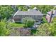 Beautiful aerial view of a home with a landscaped backyard, patio and green lawns at 14215 Stacey St, Carmel, IN 46033