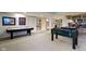 Recreation area featuring an air hockey table, foosball table, and a pool table at 14215 Stacey St, Carmel, IN 46033